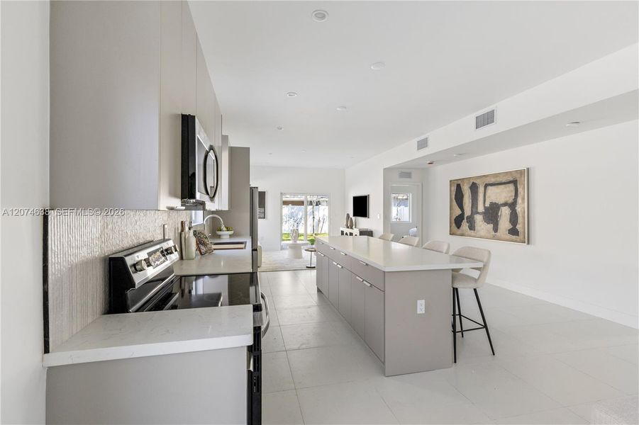 Furnished interior view inside a new home in , Miami (Image 15). Furnished interior view inside a new home in , Miami (Image 15).