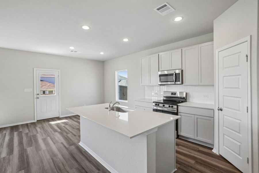 Furnished interior view inside a new home in Edgebrooke, Pflugerville (Image 5).
