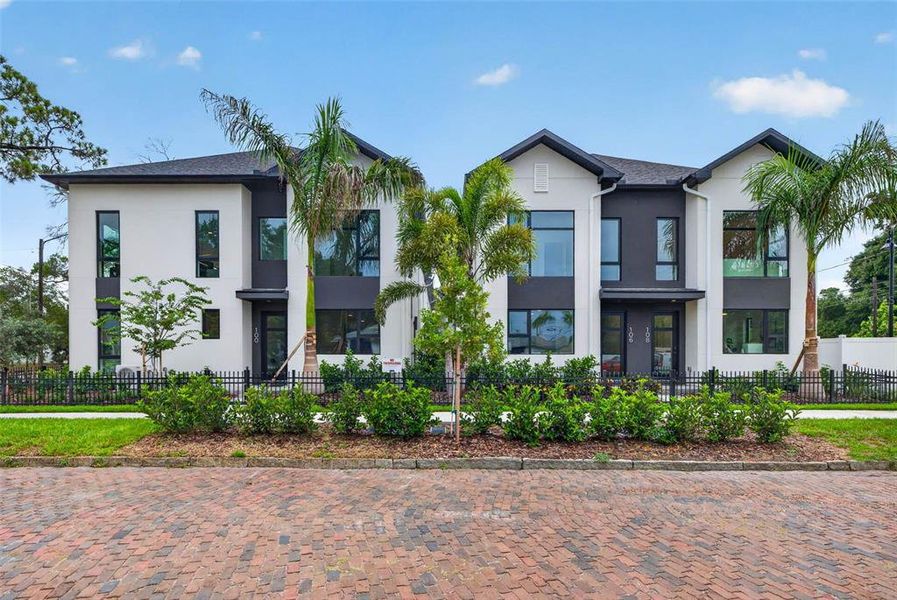 Front exterior of a new home in , St. Petersburg, FL, highlighting curb appeal (Image 15). Front exterior of a new home in , St. Petersburg, FL, highlighting curb appeal (Image 15).