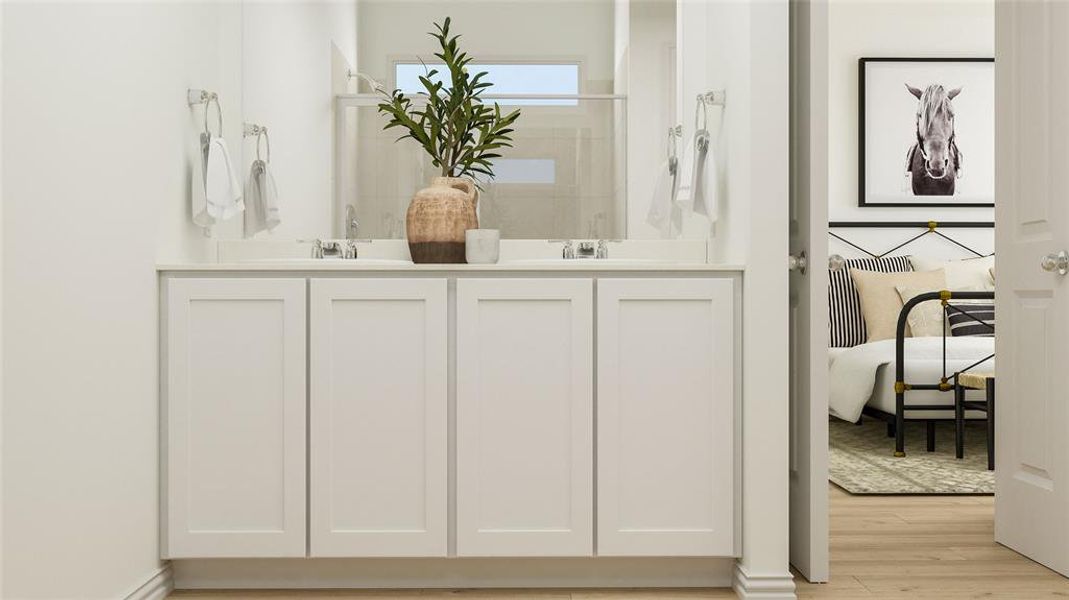 Bathroom with vanity, hardwood / wood-style floors, and an enclosed shower