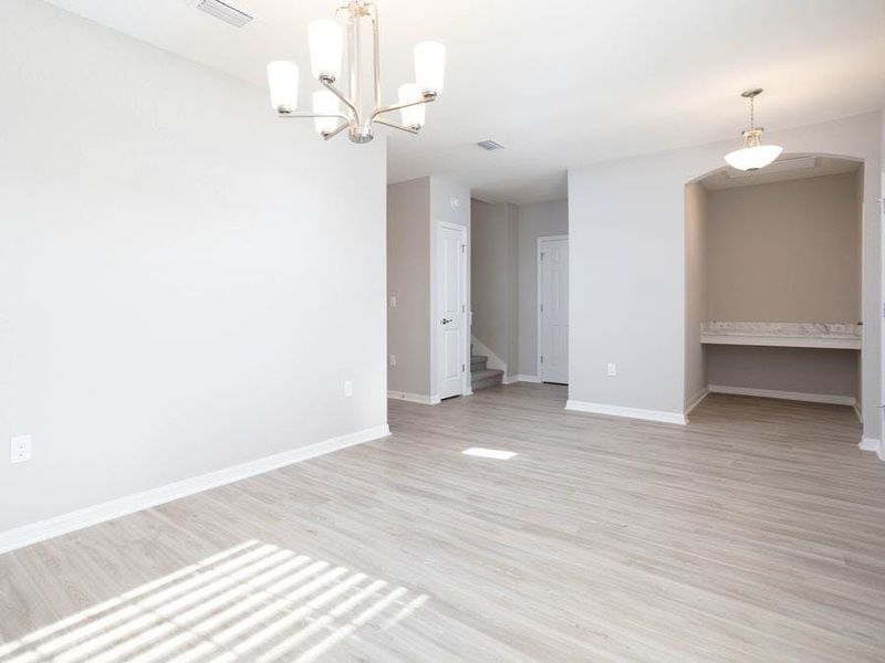 A convenient drop zone and flex-use dining room are located off the foyer - Wayfair III by Highland Homes A convenient drop zone and flex-use dining room are located off the foyer - Wayfair III by Highland Homes