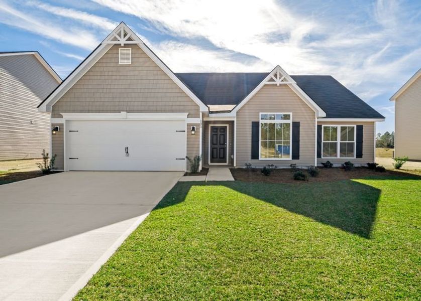 Front exterior of a new home in Settlers Hammock, Kingsland, GA, highlighting curb appeal (Image 1).