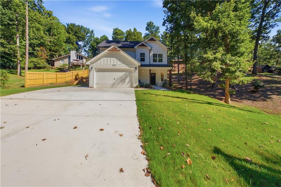 Front exterior of a new home in , Cumming, GA, highlighting curb appeal (Image 20). Front exterior of a new home in , Cumming, GA, highlighting curb appeal (Image 20).