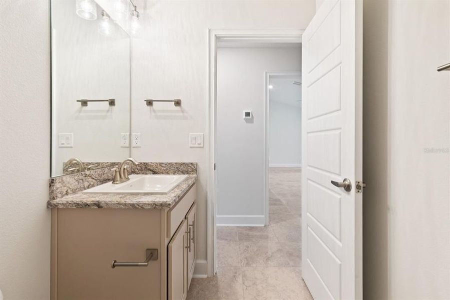 Representative furnished interior of a home built from the 1540 by Adams Homes in Okeechobee, Okeechobee (Image 9).