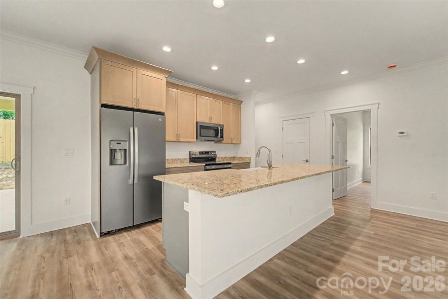 Furnished interior view inside a new home in , Waynesville (Image 6).