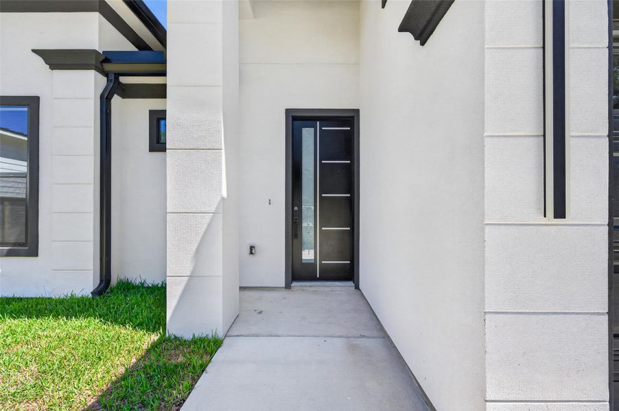 Exterior details and patio area of a home in , Conroe (Image 31).