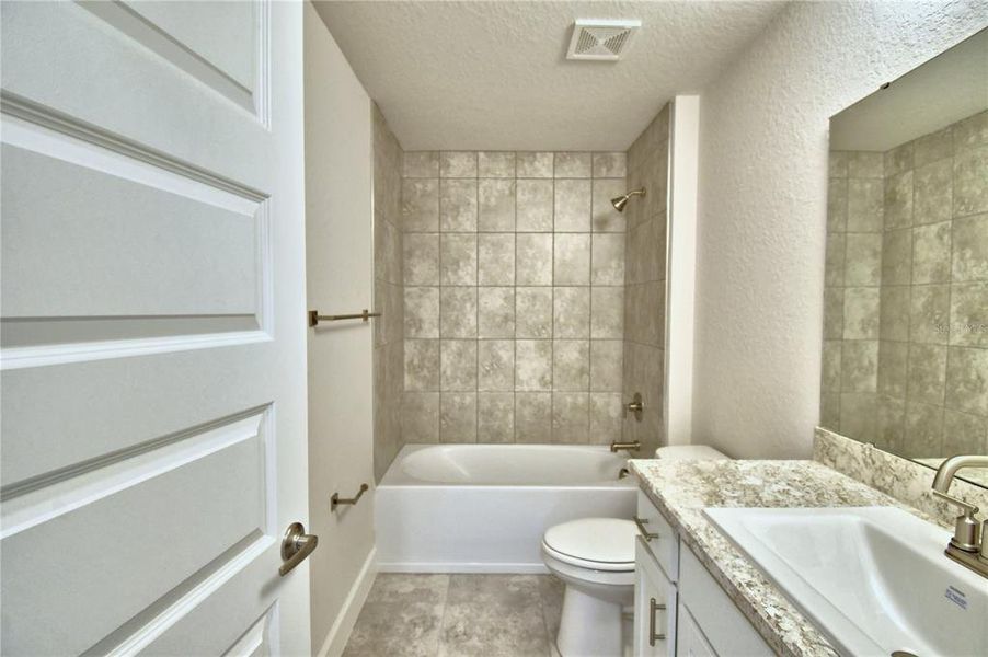 Furnished interior view inside a new home in Cadence Crossing, Auburndale (Image 9). Furnished interior view inside a new home in Cadence Crossing, Auburndale (Image 9).