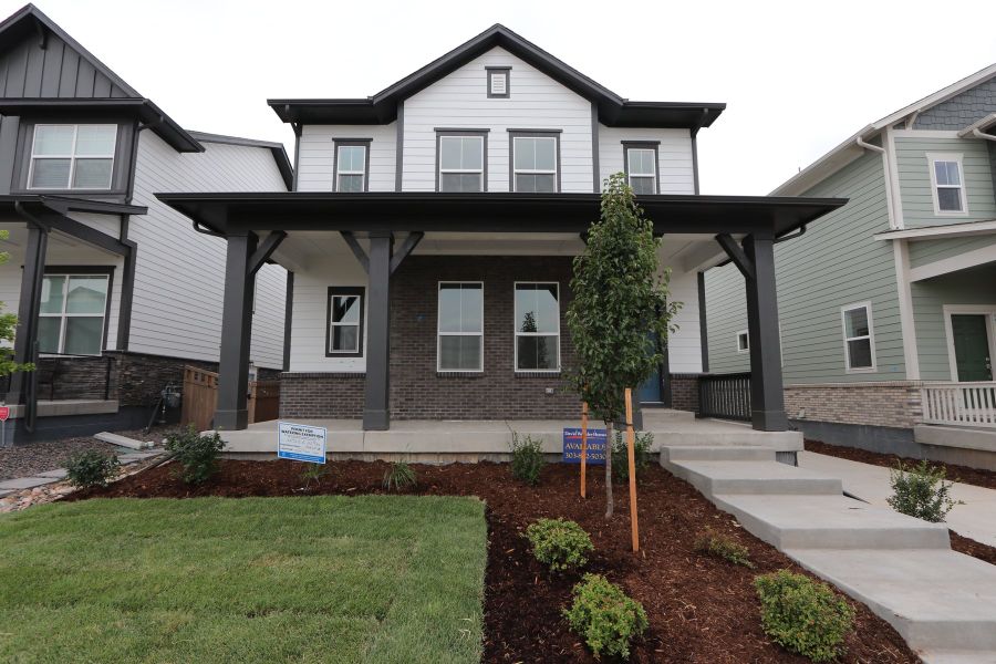 Exterior details and patio area of a home in Painted Prairie Cottage, Aurora (Image 3). Exterior details and patio area of a home in Painted Prairie Cottage, Aurora (Image 3).