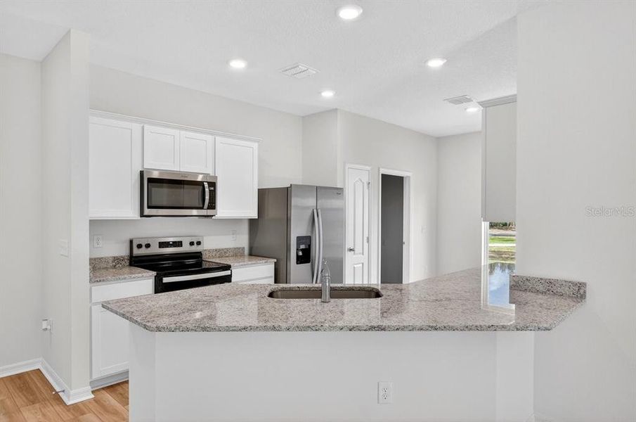 Furnished interior view inside a new home in , Deltona (Image 8).