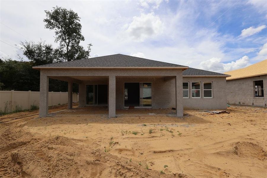 Exterior details and patio area of a home in Emerson Pointe, Apopka (Image 14).