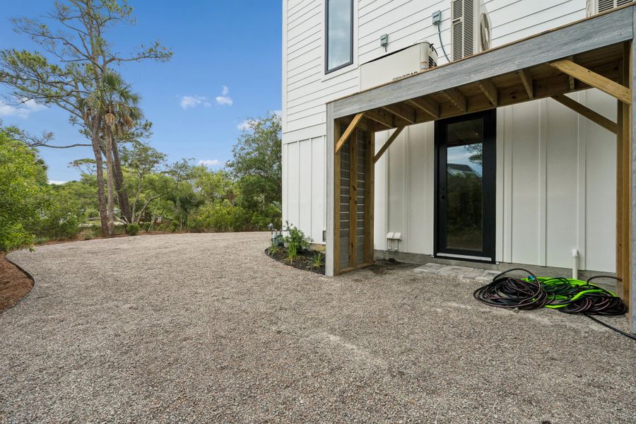 Exterior details and patio area of a home in , Folly Beach (Image 37).
