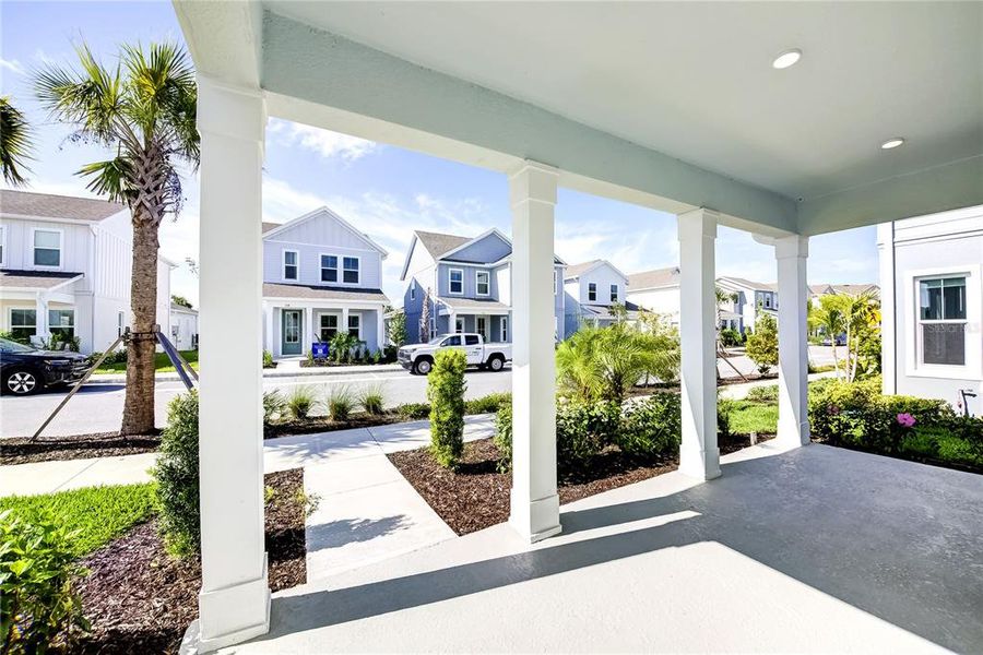 Exterior details and patio area of a home in Bungalow Walk at Lakewood Ranch, Sarasota (Image 4).