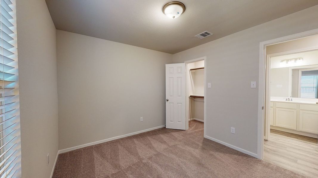 Representative unfurnished interior of a home built from the Floor Plan 1605 by Colina Homes in River Ranch, Dayton (Image 19).