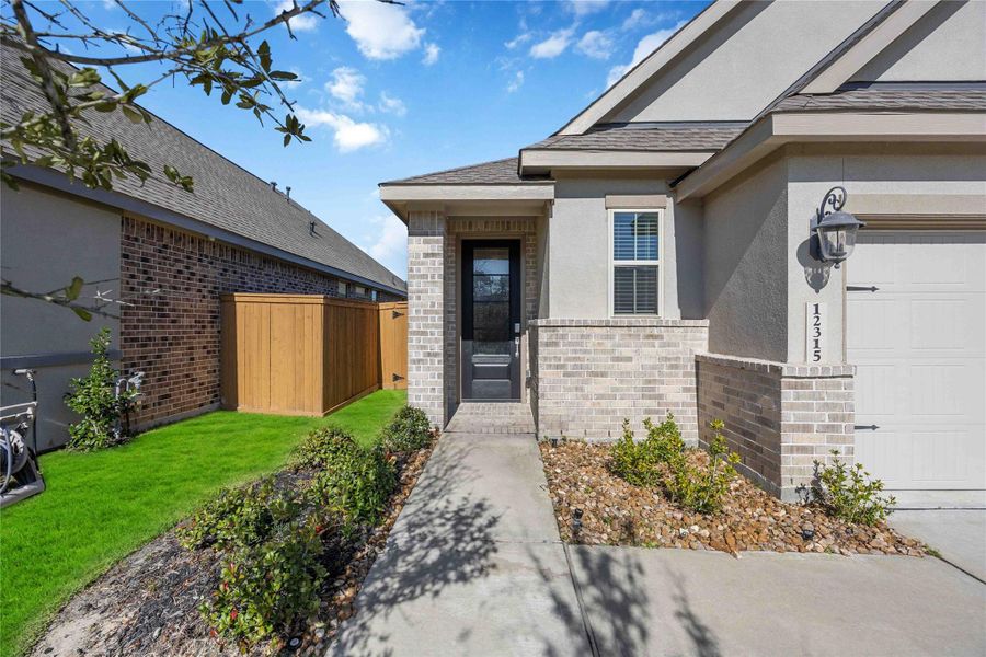 Exterior details and patio area of a home in Balmoral: Avante Collection, Houston (Image 4). Exterior details and patio area of a home in Balmoral: Avante Collection, Houston (Image 4).