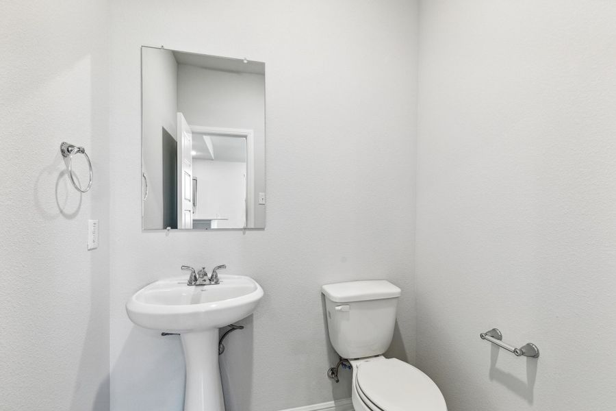 Bathroom in the Sapphire home plan by Trophy Signature Homes – REPRESENTATIVE PHOTO