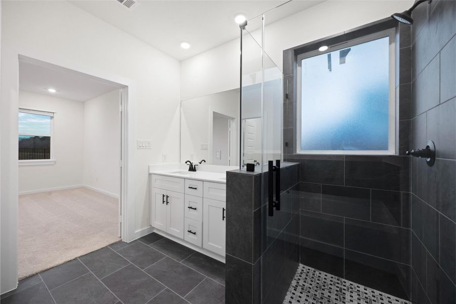 Beautiful shower tiled floor is a great accent piece. Beautiful shower tiled floor is a great accent piece.