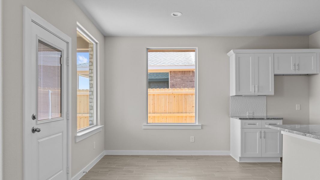 Representative unfurnished interior of a home built from the CARLSBAD by D.R. Horton in Northwest Passage, Midland (Image 8). Representative unfurnished interior of a home built from the CARLSBAD by D.R. Horton in Northwest Passage, Midland (Image 8).
