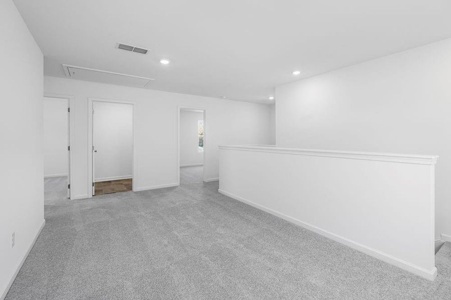 Spacious, unfurnished interior of a new home in Windance Lake, Loganville (Image 38).