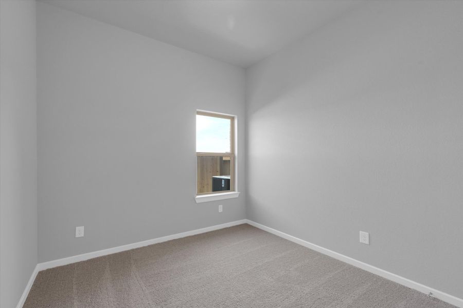 Spacious, unfurnished interior of a new home in Sunterra 40, Katy (Image 18).