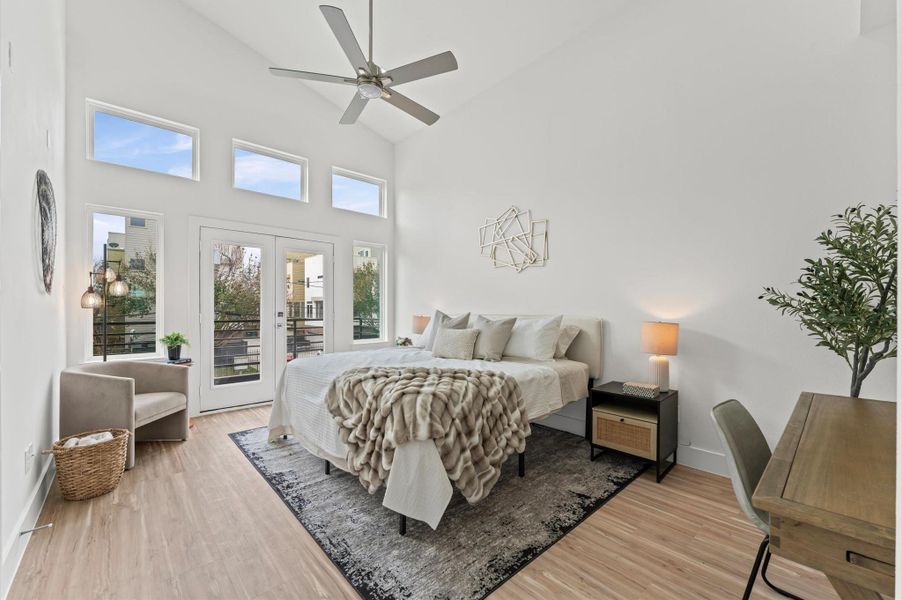 Primary Bedroom with plenty of natural light and balcony Primary Bedroom with plenty of natural light and balcony