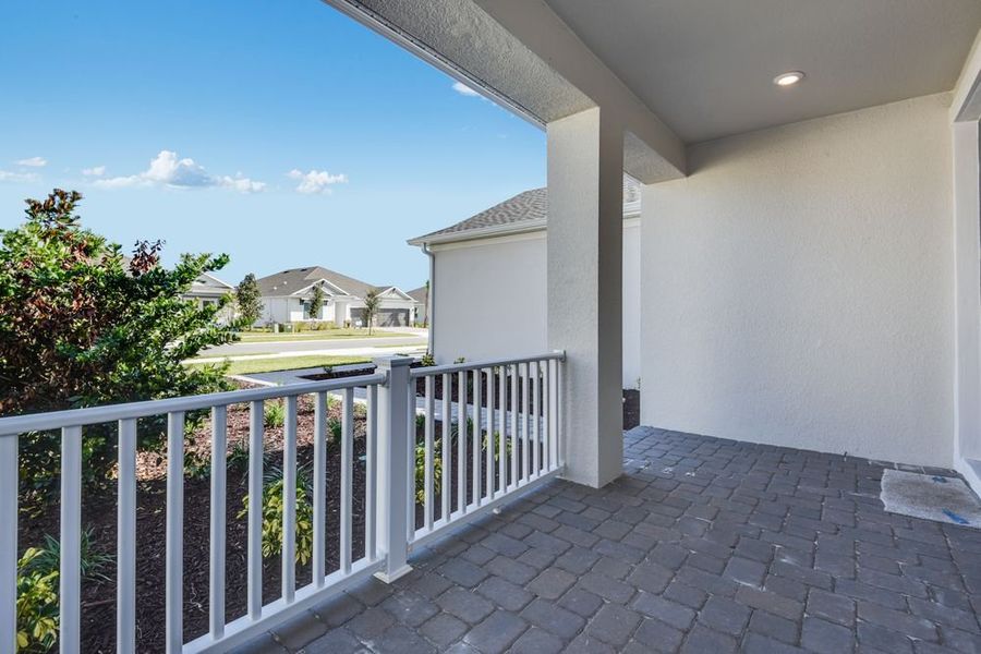 Exterior details and patio area of a home in Ardisia Park, New Smyrna Beach (Image 20).