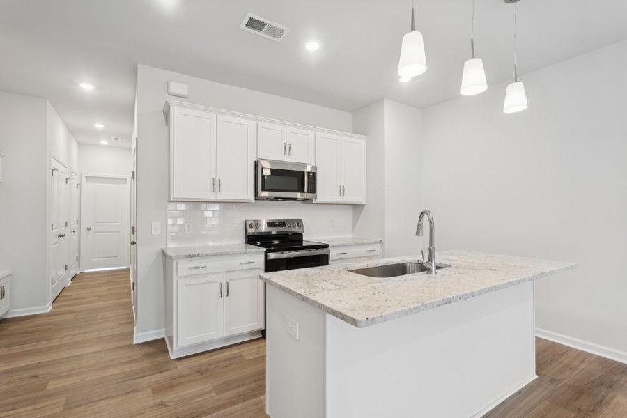 Furnished interior view inside a new home in Lakeview Village, Charlotte (Image 4). Furnished interior view inside a new home in Lakeview Village, Charlotte (Image 4).