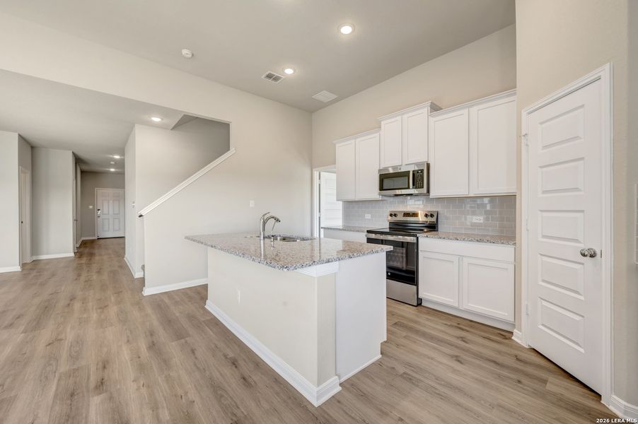 Furnished interior view inside a new home in Paloma Park, Converse (Image 9).