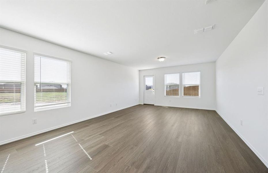 Bright and open gathering space with an adjoining nook Bright and open gathering space with an adjoining nook