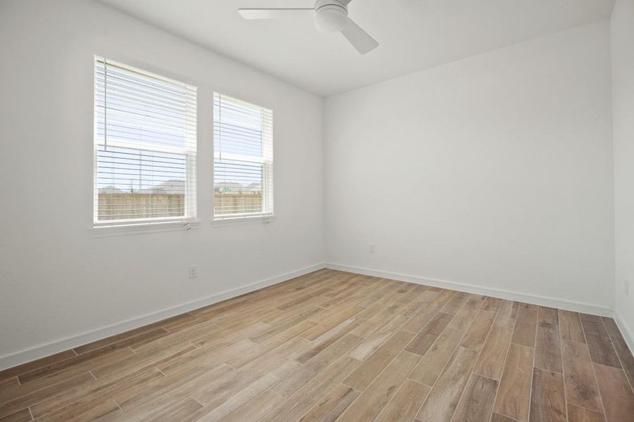 Spacious, unfurnished interior of a new home in Westland Ranch - 70' Homesites, League City (Image 23).