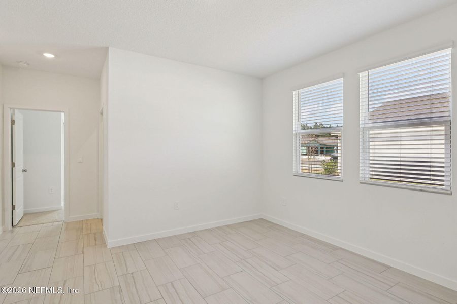 Spacious, unfurnished interior of a new home in Lakes at Bella Lago - Signature Series, Green Cove Springs (Image 38).