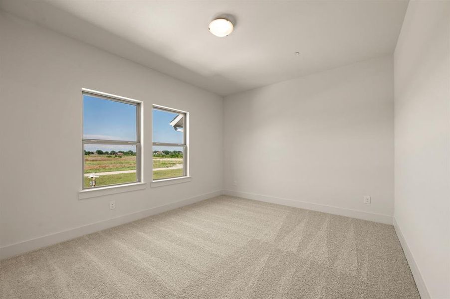 Our Bella plan offers a spacious secondary bedroom complete with en suite bath!