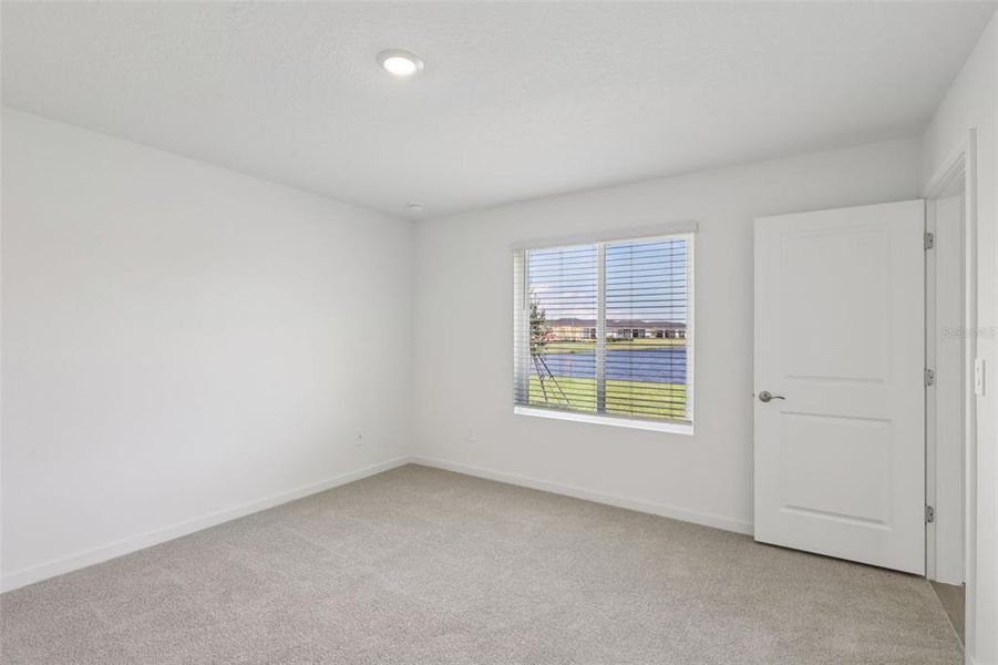 Spacious, unfurnished interior of a new home in Colbert Landings, Palm Coast (Image 15).