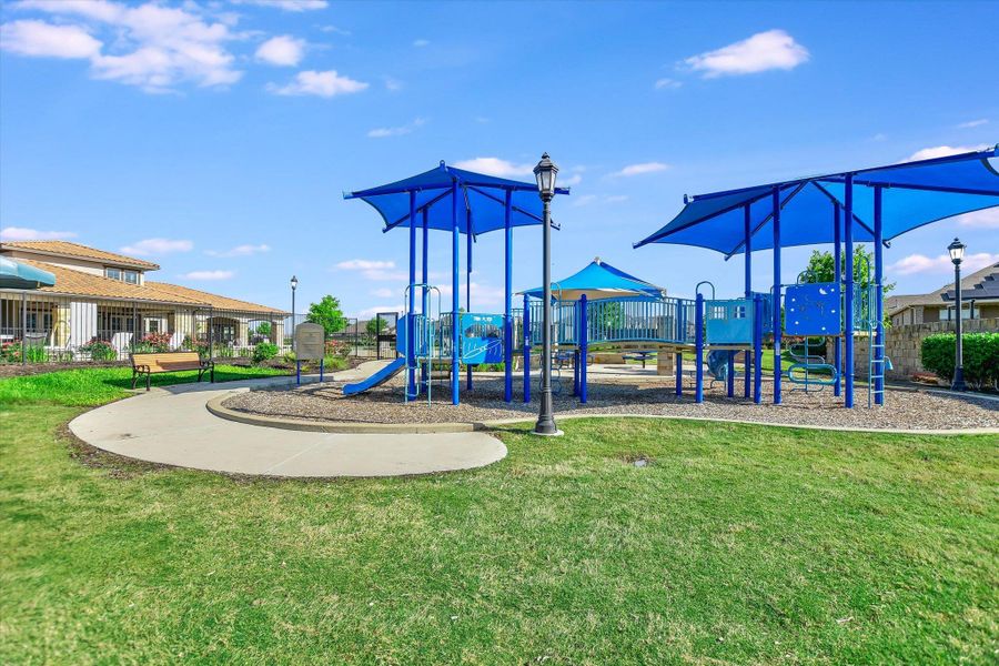 Community playground with a yard