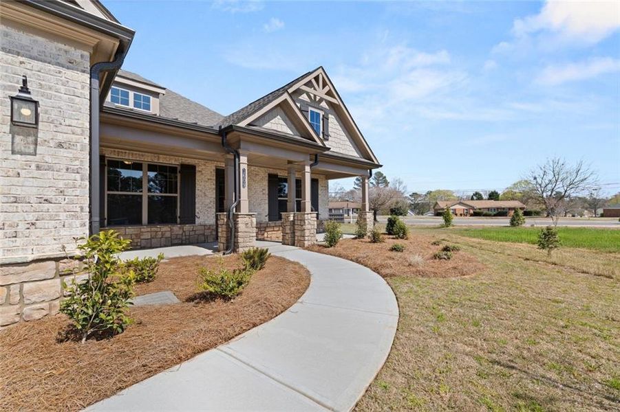 Front exterior of a new home in Soleil Summit Chase, Snellville, GA, highlighting curb appeal (Image 1).