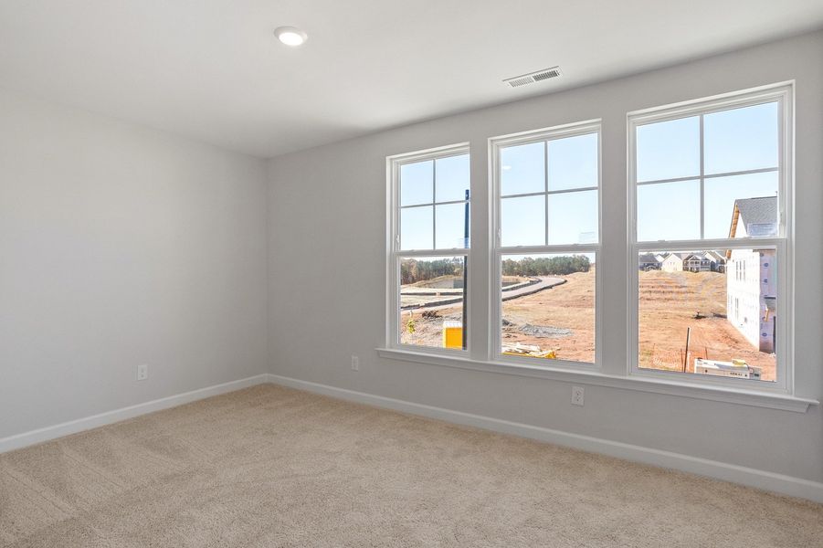 Spacious, unfurnished interior of a new home in Sweetbrier, Durham (Image 25).