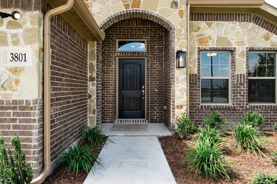 Exterior details and patio area of a home in Fox Landing, Caddo Mills (Image 3).