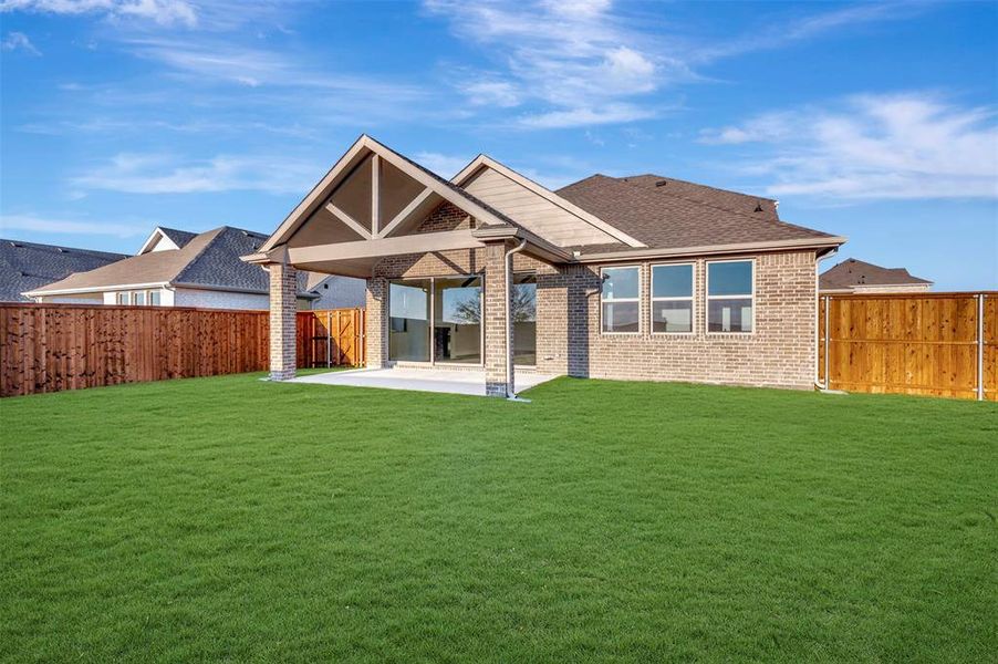 Exterior details and patio area of a home in Gateway Parks, Forney (Image 22).