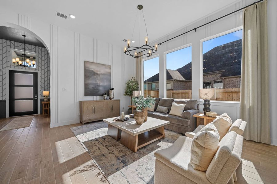 Representative furnished interior of a home built from the Bonneville 50′ Lot by Chesmar Homes in Elyson, Katy (Image 7).