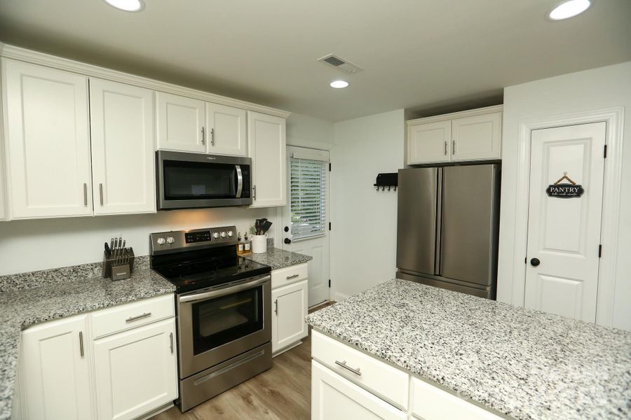 Furnished interior view inside a new home in , Kannapolis (Image 10).