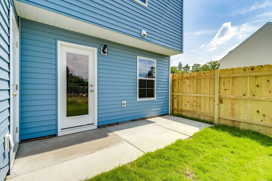 Exterior details and patio area of a home in Padgett Commons, Hopkins (Image 3).