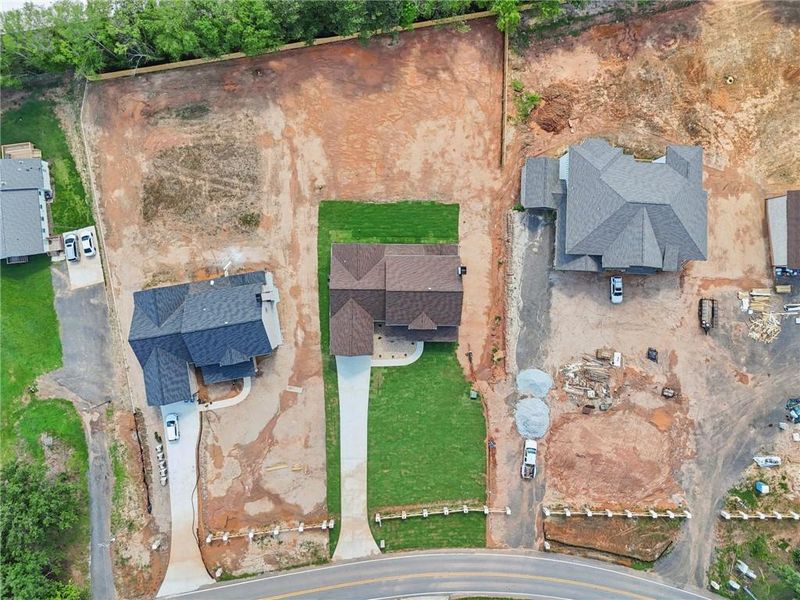 Front exterior of a new home in , Lilburn, GA, highlighting curb appeal (Image 36).