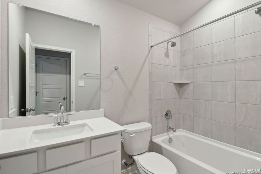 Furnished interior view inside a new home in Thomas Pond, San Antonio (Image 9).