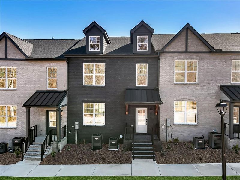 Front exterior of a new home in , Sugar Hill, GA, highlighting curb appeal (Image 2). Front exterior of a new home in , Sugar Hill, GA, highlighting curb appeal (Image 2).