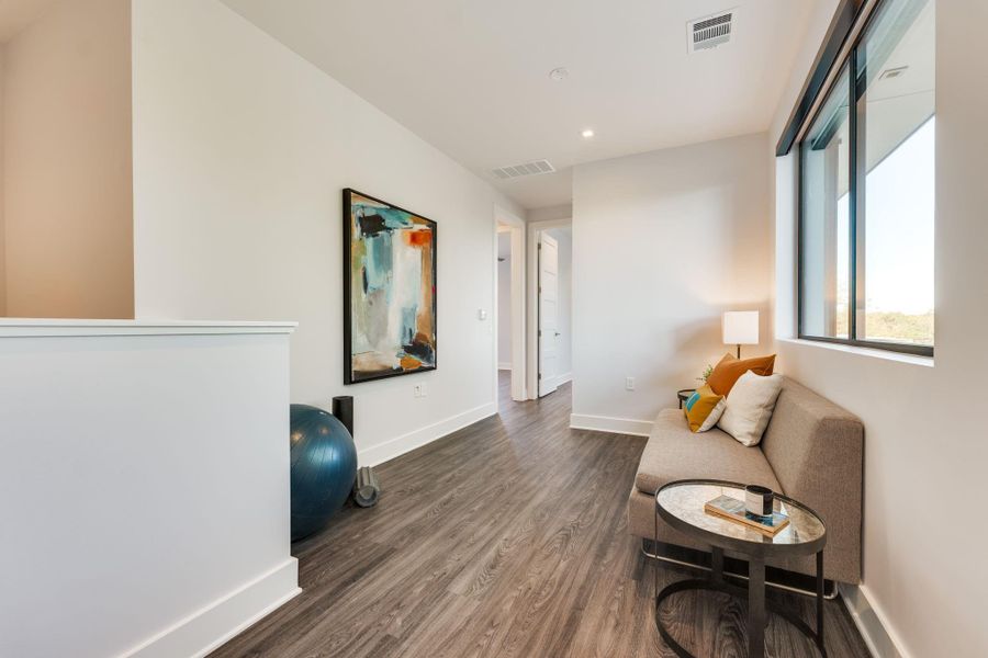 The bonus area in the main home offers a versatile space that can be tailored to fit your lifestyle, whether it’s used as a game room, home office, or a cozy sitting area.