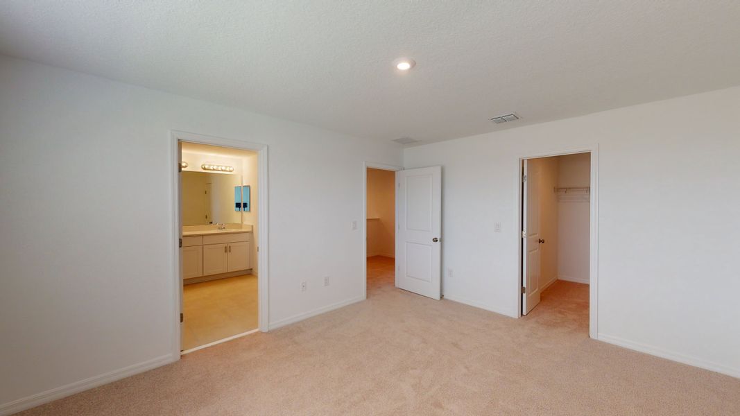 Representative unfurnished interior of a home built from the Kingfisher by Taylor Morrison in Solena, North Fort Myers (Image 9).