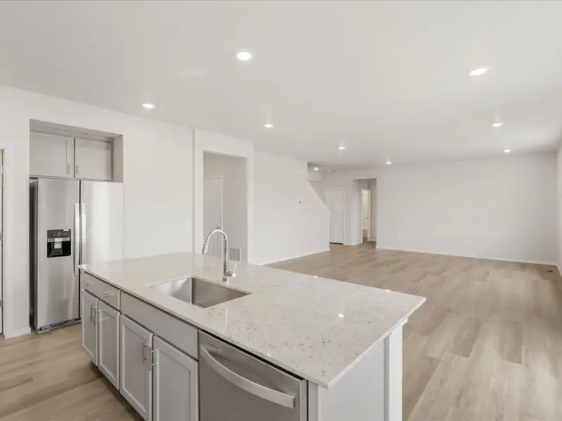 Furnished interior view inside a new home in Paint Brush Hills, Peyton (Image 4).