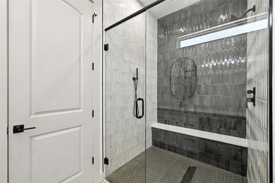 Full bathroom featuring a stall shower Full bathroom featuring a stall shower
