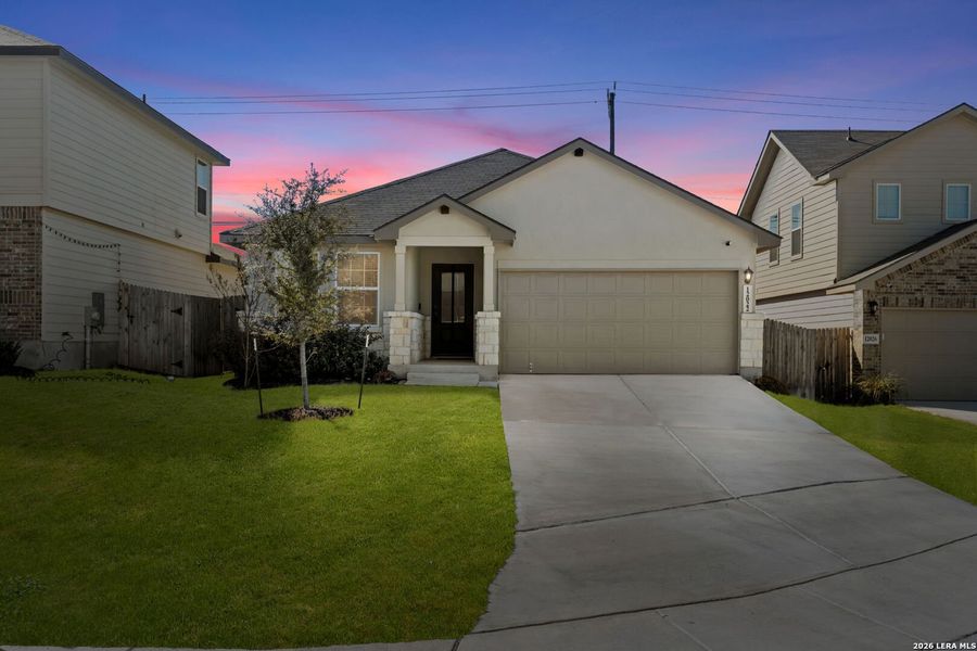 Front exterior of a new home in The Canyons at Amhurst, San Antonio, TX, highlighting curb appeal (Image 24).