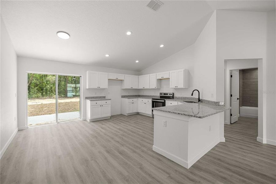 Furnished interior view inside a new home in , Dunnellon (Image 6).