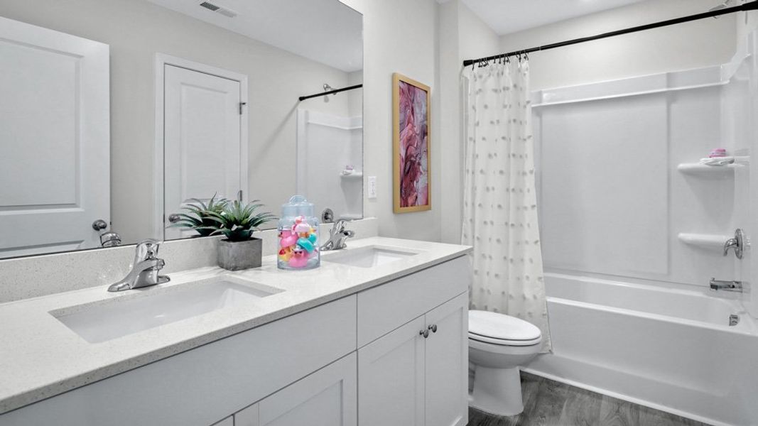 Furnished interior view inside a new home in North Village Townes, Greensboro (Image 14).